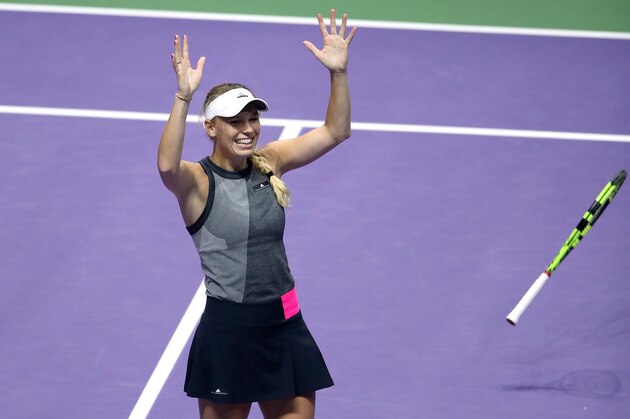 SINGAPORE - OCTOBER 29:  Caroline Wozniacki of Denmark celebrates victory in the Singles Final against Venus Williams of the United States during day 8 of the BNP Paribas WTA Finals Singapore presented by SC Global at Singapore Sports Hub on October 29, 2017 in Singapore.  (Photo by Matthew Stockman/Getty Images)