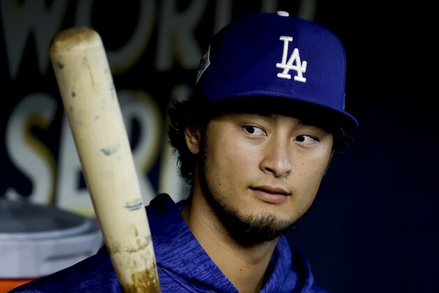 Los Angeles Dodgers starting pitcher Yu Darvish, of Japan, watches batting practice before Game 4 of baseball's World Series Houston Astros Saturday, Oct. 28, 2017, in Houston. (AP Photo/Matt Slocum)