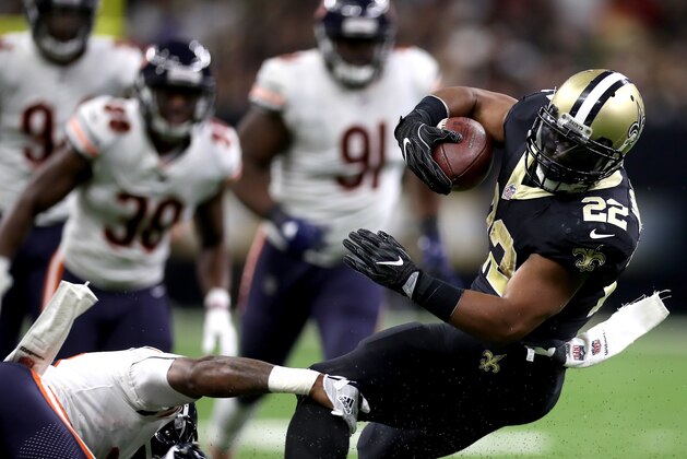 NEW ORLEANS, LA - OCTOBER 29:   Mark Ingram #22 of the New Orleans Saints is tackeld by  Eddie Jackson #39 of the Chicago Bears during the second quarter at the Mercedes-Benz Superdome on October 29, 2017 in New Orleans, Louisiana.  (Photo by Chris Graythen/Getty Images)