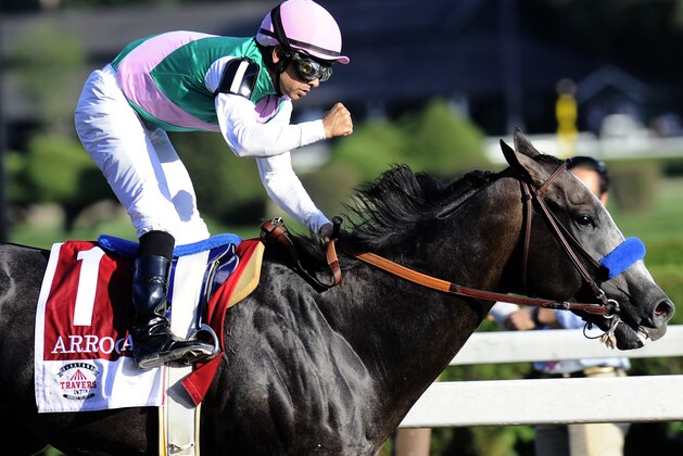 FILE - In this Aug. 27, 2016, file photo, Jockey Mike Smith celebrates aboard Arrogate after winning the Travers Stakes horse race at Saratoga Race Course in Saratoga Springs, N.Y. The ride is far from over for Smith, even at age 51. The jockey known as