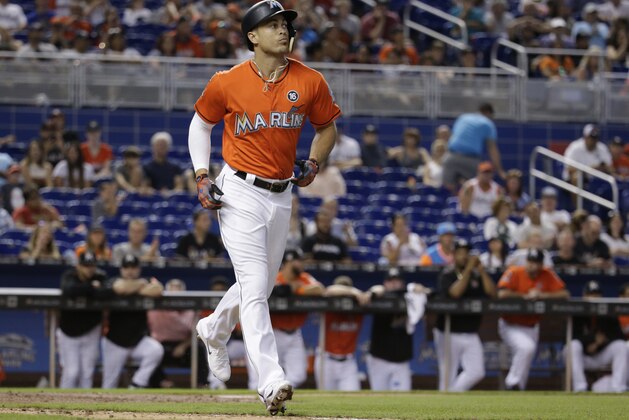 Miami Marlins' Giancarlo Stanton draws a walk during a baseball game against the Philadelphia Phillies, Sunday, Sept. 3, 2017, in Miami. The Phillies won 3-1. (AP Photo/Lynne Sladky)