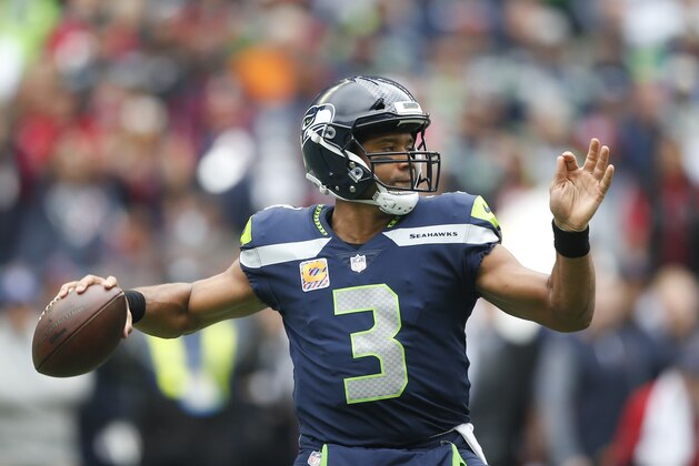 SEATTLE, WA - OCTOBER 29: Quarterback Russell Wilson #3 of the Seattle Seahawks passes against the Houston Texans at CenturyLink Field on October 29, 2017 in Seattle, Washington. (Photo by Otto Greule Jr/Getty Images)