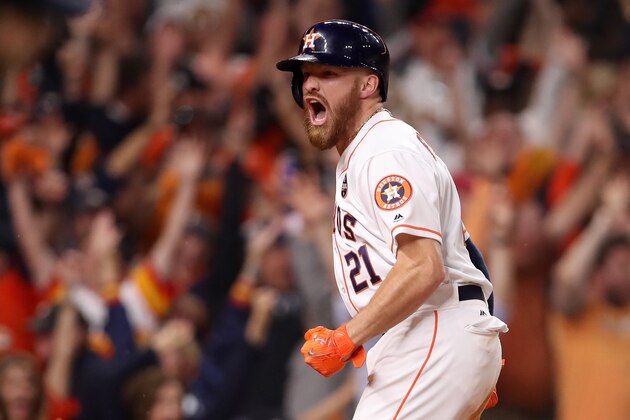 HOUSTON, TX - OCTOBER 30: Derek Fisher #21 of the Houston Astros celebrates after scoring the winning run during the tenth inning against the Los Angeles Dodgers in game five of the 2017 World Series at Minute Maid Park on October 30, 2017 in Houston, Texas.  (Photo by Christian Petersen/Getty Images)