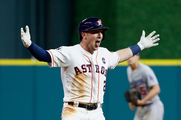 HOUSTON, TX - OCTOBER 30:  Alex Bregman #2 of the Houston Astros celebrates after hitting a game-winning single during the tenth inning against the Los Angeles Dodgers in game five of the 2017 World Series at Minute Maid Park on October 30, 2017 in Houston, Texas.  (Photo by Jamie Squire/Getty Images)