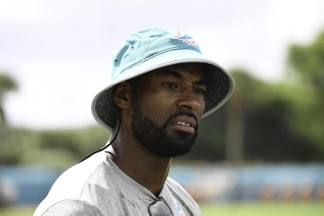 DAVIE, FL - AUGUST 08:  Former Detroit Lions wide receiver Calvin Johnson looks on at Miami Dolphins training camp on August 8, 2017 at the Miami Dolphins training facility in Davie, Florida.  (Photo by Ron Elkman/Sports Imagery/ Getty Images)