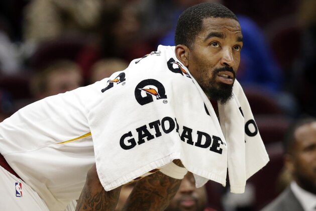Cleveland Cavaliers' JR Smith watches in the final seconds in the second half of an NBA basketball game against the New York Knicks, Sunday, Oct. 29, 2017, in Cleveland. (AP Photo/Tony Dejak)