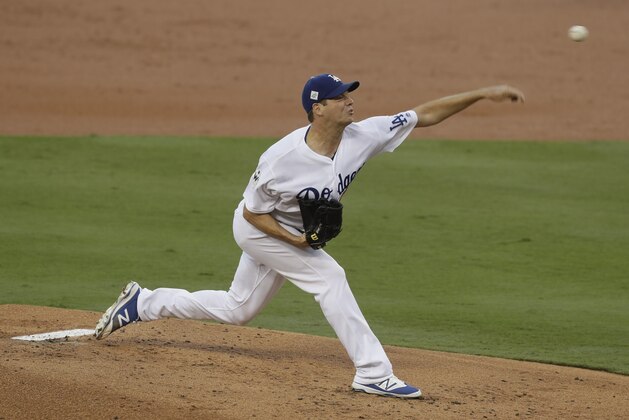 Los Angeles Dodgers starting pitcher Rich Hill throws during the first inning of Game 2 of baseball's World Series against the Houston Astros Wednesday, Oct. 25, 2017, in Los Angeles. (AP Photo/Alex Gallardo)