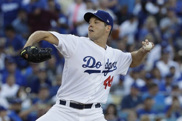 Los Angeles Dodgers starting pitcher Rich Hill throws during the first inning of Game 2 of baseball's World Series against the Houston Astros Wednesday, Oct. 25, 2017, in Los Angeles. (AP Photo/David J. Phillip)