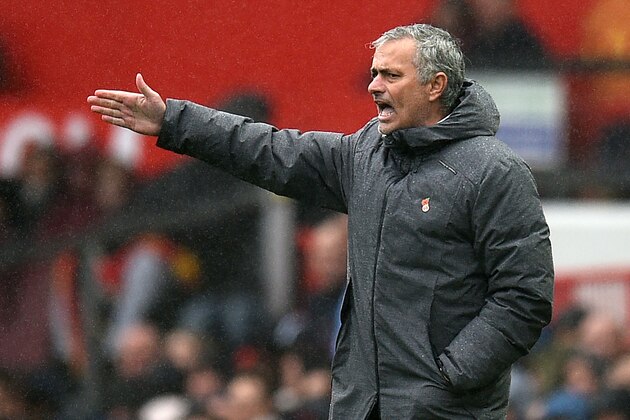 Manchester United's Portuguese manager Jose Mourinho gestures on the touchline during the English Premier League football match between Manchester United and Tottenham Hotspur at Old Trafford in Manchester, north west England, on October 28, 2017.
Manchester United won the game 1-0. / AFP PHOTO / Oli SCARFF / RESTRICTED TO EDITORIAL USE. No use with unauthorized audio, video, data, fixture lists, club/league logos or 'live' services. Online in-match use limited to 75 images, no video emulation. No use in betting, games or single club/league/player publications.  /         (Photo credit should read OLI SCARFF/AFP/Getty Images)