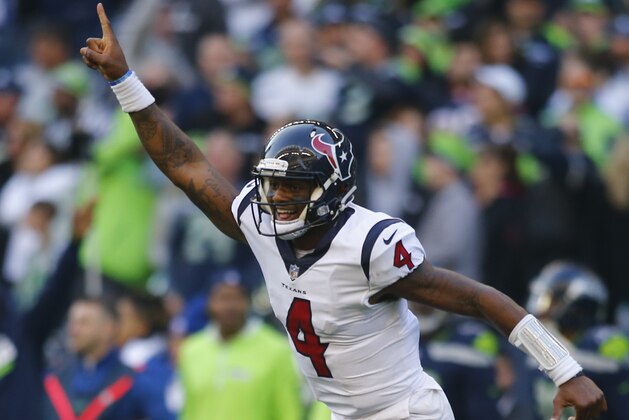 SEATTLE, WA - OCTOBER 29:  Quarterback Deshaun Watson #4 of the Houston Texans cheers as DeAndre Hopkins #10 scores a 72 yard touchdown against the Seattle Seahawks in the fourth quarter at CenturyLink Field on October 29, 2017 in Seattle, Washington. (Photo by Jonathan Ferrey/Getty Images)