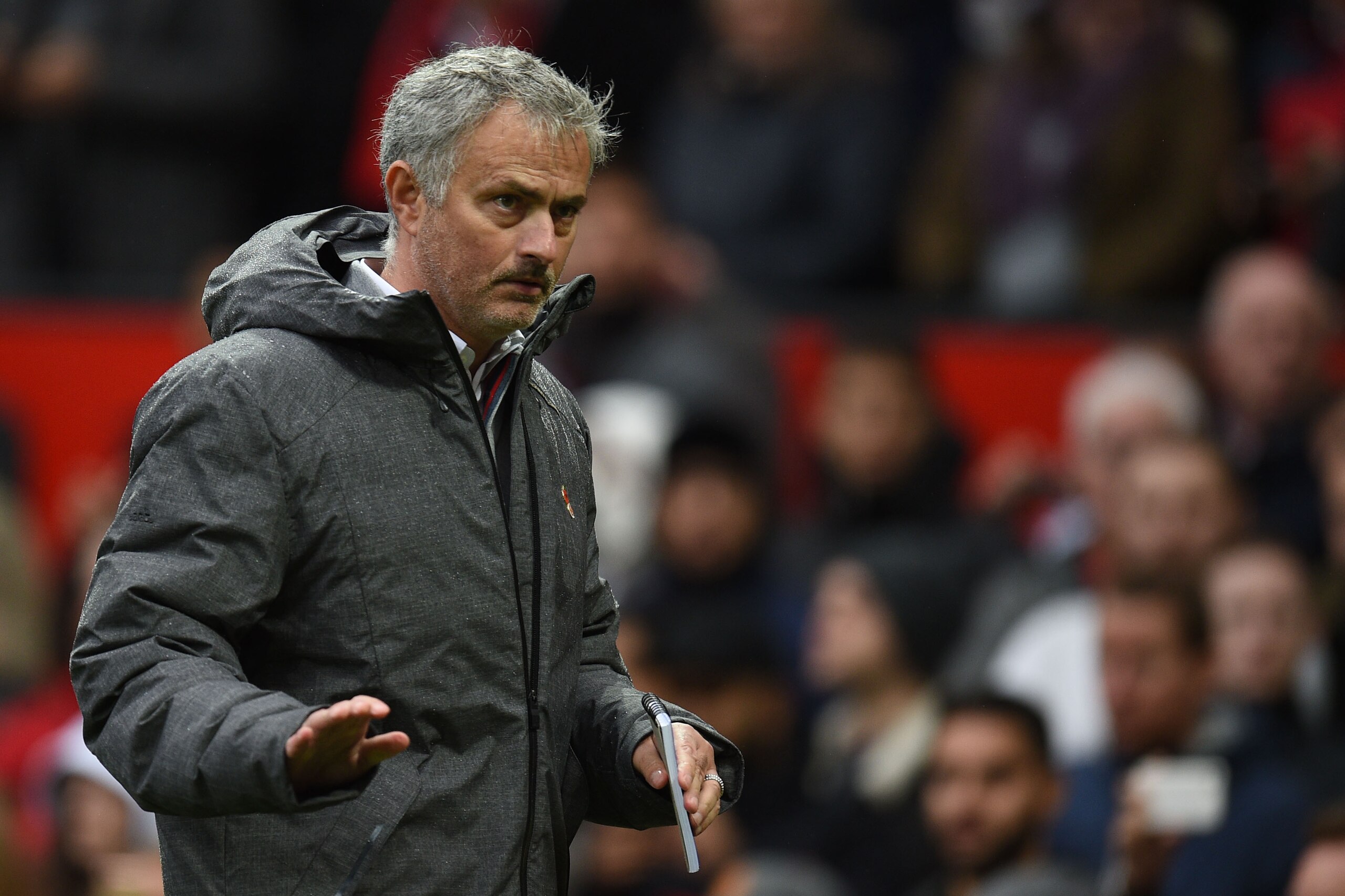 Manchester United's Portuguese manager Jose Mourinho leaves at half time in the English Premier League football match between Manchester United and Tottenham Hotspur at Old Trafford in Manchester, north west England, on October 28, 2017. / AFP PHOTO / Oli SCARFF / RESTRICTED TO EDITORIAL USE. No use with unauthorized audio, video, data, fixture lists, club/league logos or 'live' services. Online in-match use limited to 75 images, no video emulation. No use in betting, games or single club/league/player publications.  /         (Photo credit should read OLI SCARFF/AFP/Getty Images)