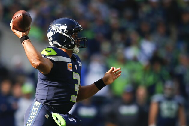 SEATTLE, WA - OCTOBER 29: Quarterback Russell Wilson #3 of the Seattle Seahawks passes against the Houston Texans at CenturyLink Field on October 29, 2017 in Seattle, Washington. (Photo by Jonathan Ferrey/Getty Images)