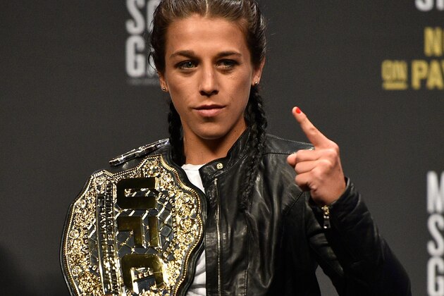 LAS VEGAS, NV - OCTOBER 06: UFC strawweight champion Joanna Jedrzejczyk poses for photos during the UFC 217 news conference inside T-Mobile Arena on October 6, 2017 in Las Vegas, Nevada. (Photo by Jeff Bottari/Zuffa LLC/Zuffa LLC via Getty Images) LAS VEGAS, NV - OCTOBER 06: UFC strawweight champion Joanna Jedrzejczyk poses for photos during the UFC 217 news conference inside T-Mobile Arena on October 6, 2017 in Las Vegas, Nevada. (Photo by Jeff Bottari/Zuffa LLC/Zuffa LLC via Getty Images)