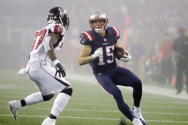 New England Patriots wide receiver Chris Hogan (15) runs after catching a pass while Atlanta Falcons safety Ricardo Allen (37) pursues during the second half of an NFL football game, Sunday, Oct. 22, 2017, in Foxborough, Mass. (AP Photo/Steven Senne)
