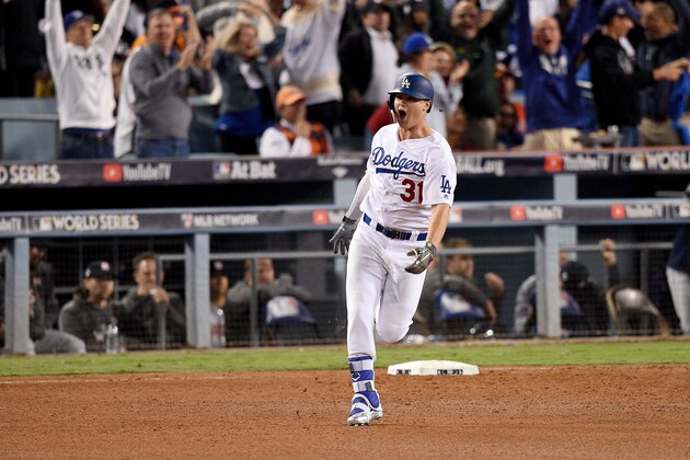 LOS ANGELES, CA - OCTOBER 31:  Joc Pederson #31 of the Los Angeles Dodgers celebrates as he runs the bases after hitting a solo home run during the seventh inning against the Houston Astros in game six of the 2017 World Series at Dodger Stadium on October 31, 2017 in Los Angeles, California.  (Photo by Kevork Djansezian/Getty Images)