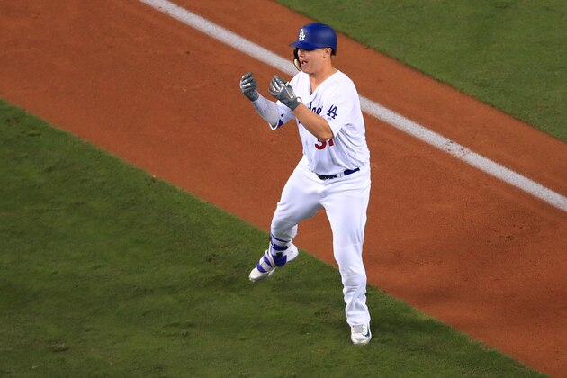 LOS ANGELES, CA - OCTOBER 31:  Joc Pederson #31 of the Los Angeles Dodgers celebrates after hitting a solo home run during the seventh inning against the Houston Astros in game six of the 2017 World Series at Dodger Stadium on October 31, 2017 in Los Angeles, California.  (Photo by Sean M. Haffey/Getty Images)