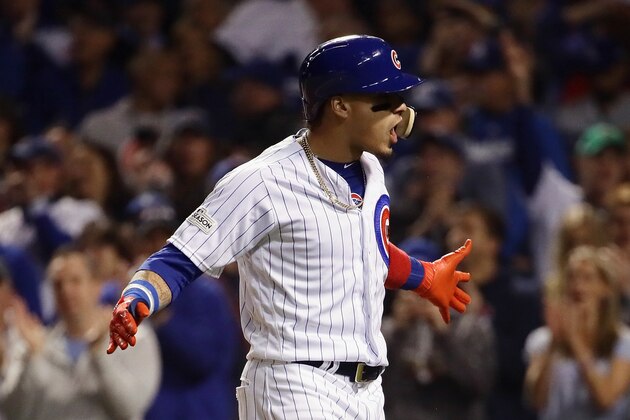 CHICAGO, IL - OCTOBER 18:  Javier Baez #9 of the Chicago Cubs celebrates after hitting a home run in the second inning against the Los Angeles Dodgers during game four of the National League Championship Series at Wrigley Field on October 18, 2017 in Chicago, Illinois.  (Photo by Jonathan Daniel/Getty Images)