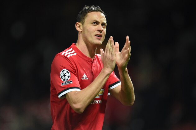 Manchester United's Serbian midfielder Nemanja Matic applauds supporters after the UEFA Champions League Group A football match between Manchester United and Benfica at Old Trafford in Manchester, north west England on October 31, 2017.
Manchester United won the game 2-0. / AFP PHOTO / Oli SCARFF        (Photo credit should read OLI SCARFF/AFP/Getty Images)