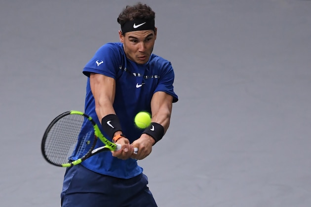 Spain's Rafael Nadal returns the ball to South Korea's Hyeon Chung during their second round match at the ATP World Tour Masters 1000 indoor tennis tournament on November 1, 2017 in Paris. / AFP PHOTO / CHRISTOPHE ARCHAMBAULT        (Photo credit should read CHRISTOPHE ARCHAMBAULT/AFP/Getty Images)