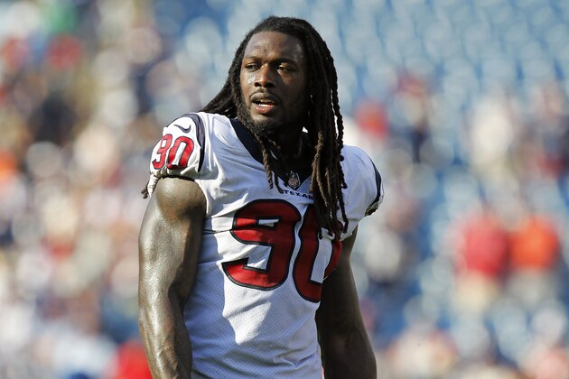 Houston Texans linebacker Jadeveon Clowney (90) walks off the field after losing to the New England Patriots in an NFL football game, Sunday, Sept. 24, 2017, in Foxborough, Mass. (AP Photo/Stew Milne)