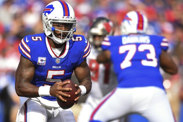 Buffalo Bills quarterback Tyrod Taylor (5) runs with the ball against the Tampa Bay Buccaneers during the first half of an NFL football game Sunday, Oct. 22, 2017, in Orchard Park, N.Y. (AP Photo/Rich Barnes)