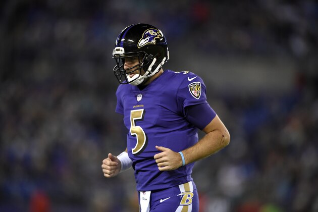 Baltimore Ravens quarterback Joe Flacco walks on the field in the first half of an NFL football game against the Miami Dolphins, Thursday, Oct. 26, 2017, in Baltimore. (AP Photo/Nick Wass)