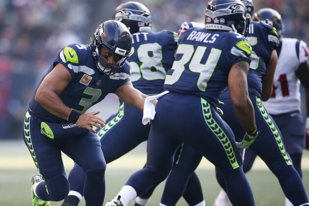 SEATTLE, WA - OCTOBER 29: Quarterback Russell Wilson #3 of the Seattle Seahawks hands the ball off to Thomas Rawls #34 against the Houston Texans at CenturyLink Field on October 29, 2017 in Seattle, Washington. (Photo by Otto Greule Jr/Getty Images) SEATTLE, WA - OCTOBER 29: Quarterback Russell Wilson #3 of the Seattle Seahawks hands the ball off to Thomas Rawls #34 against the Houston Texans at CenturyLink Field on October 29, 2017 in Seattle, Washington. (Photo by Otto Greule Jr/Getty Images)