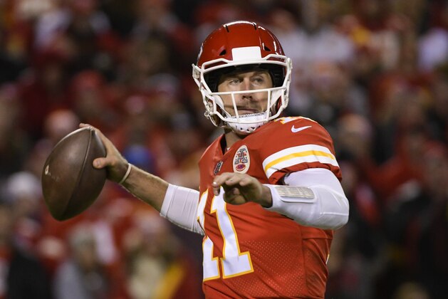 Kansas City Chiefs quarterback Alex Smith (11) throws against the Denver Broncos during the second half of an NFL football game in Kansas City, Mo., Monday, October 30, 2017. (AP Photo/Reed Hoffmann)