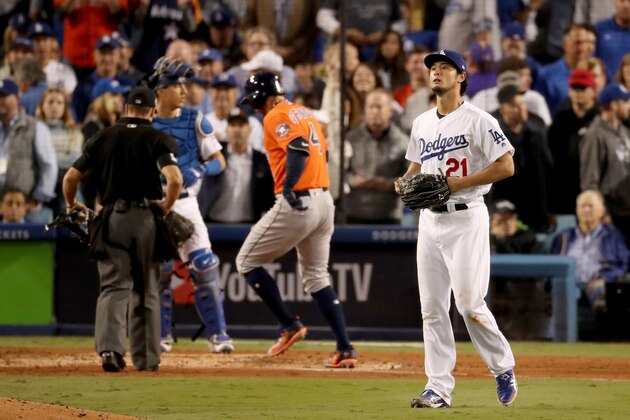 LOS ANGELES, CA - NOVEMBER 01: Yu Darvish #21 of the Los Angeles Dodgers reacts after George Springer #4 of the Houston Astros hit a two-run home run during the second inning in game seven of the 2017 World Series at Dodger Stadium on November 1, 2017 in Los Angeles, California. (Photo by Christian Petersen/Getty Images) LOS ANGELES, CA - NOVEMBER 01: Yu Darvish #21 of the Los Angeles Dodgers reacts after George Springer #4 of the Houston Astros hit a two-run home run during the second inning in game seven of the 2017 World Series at Dodger Stadium on November 1, 2017 in Los Angeles, California. (Photo by Christian Petersen/Getty Images)