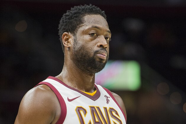 Cleveland Cavaliers' Dwayne Wade (9) walks to the foul line against the Atlanta Hawks during the first half of an NBA pre-season basketball game in Cleveland, Wednesday, Oct. 4, 2017. (AP Photo/Phil Long)