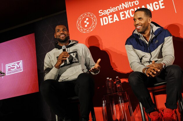 NBA superstar LeBron James (left) and LRMR CEO Maverick Carter share insight into the importance of authenticity in fan engagement at the SapientNitro Idea Exchange with Fenway Sports Management at Fenway Park in Boston, MA, Thursday, Nov. 13, 2014. Even with almost 17 million followers on Twitter and nearly 22 million on Facebook, LeBron James didn't hesitate when asked his preferred method of connecting with fans.