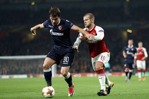 LONDON, ENGLAND - NOVEMBER 02:  Filip Stojkovic of FK Crvena Zvezda and Jack Wilshere of Arsenal battle for possession during the UEFA Europa League group H match between Arsenal FC and Crvena Zvezda at Emirates Stadium on November 2, 2017 in London, United Kingdom.  (Photo by Bryn Lennon/Getty Images)