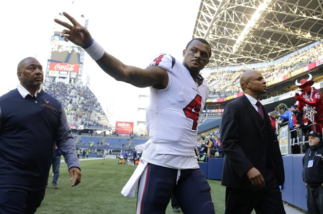 Houston Texans quarterback Deshaun Watson waves to fans as he leaves the field following an NFL football game against the Seattle Seahawks, Sunday, Oct. 29, 2017, in Seattle. The Seahawks won 41-38. (AP Photo/Stephen Brashear)