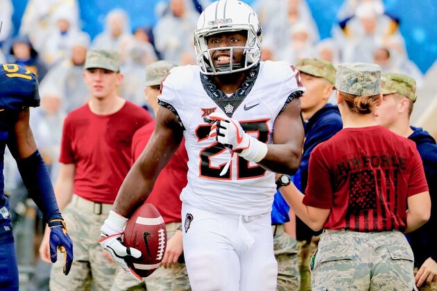 LUBBOCK, TX - SEPTEMBER 30: James Washington #28 of the Oklahoma State Cowboys on the field warming up before the game between the Texas Tech Red Raiders and the Oklahoma State Cowboys on September 30, 2017 at Jones AT&T Stadium in Lubbock, Texas. Oklahoma State won the game 41-34. (Photo by John Weast/Getty Images)