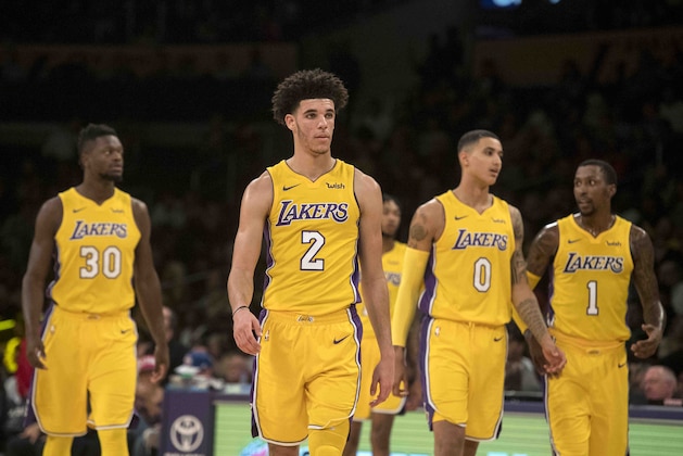 From left, Los Angeles Lakers forward Julius Randle, guard Lonzo Ball, forward Kyle Kuzma, and guard Kentavious Caldwell-Pope during the first half of an NBA basketball game Tuesday, Oct. 31, 2017, in Los Angeles. (AP Photo/Kyusung Gong)