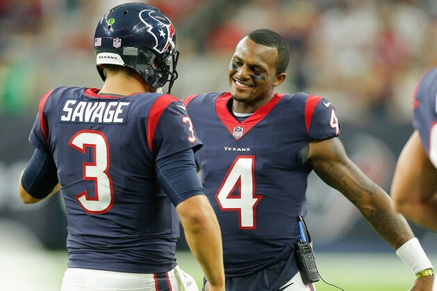 HOUSTON, TX - AUGUST 19:  Tom Savage #3 of the Houston Texans i congratulated by Deshaun Watson #4 after throwin a touchdown pass in the first quarter at NRG Stadium on August 19, 2017 in Houston, Texas.  (Photo by Bob Levey/Getty Images)