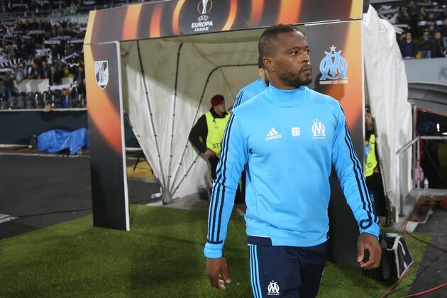 GUIMARAES, PORTUGAL - NOVEMBER 2:  Olympique Marseille Patrice Evra from France before the start of the UEFA Europa League match between Vitoria de Guimaraes and Olympique Marseille at Estadio D. Afonso Henriques on November 2, 2017 in Guimaraes, Portugal.  (Photo by Gualter Fatia/Getty Images)