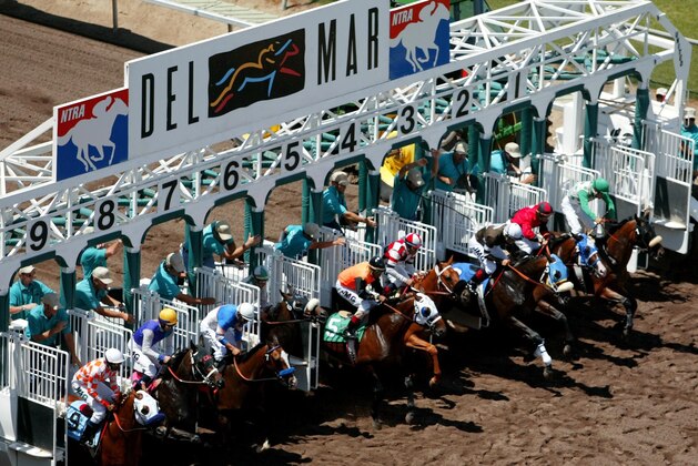 DEL MAR, CA - July 24, 2002: Overhead view of horses breaking from gate on dirt course at Del Mar Race Track July 24, 2002 (Photo by Horsephotos /Getty Images)