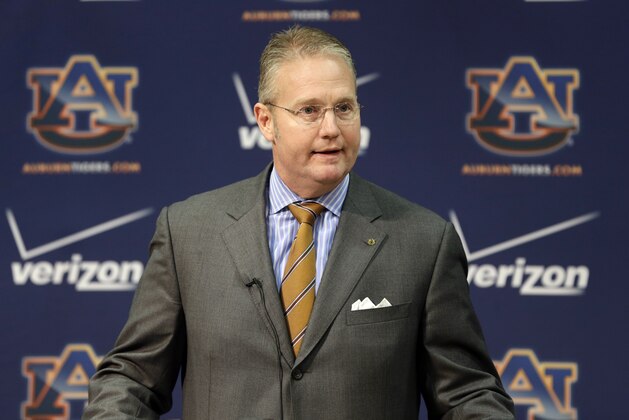 Auburn Athletic Director Jay Jacobs talks with reporters at Auburn University in Auburn, Ala., Sunday, Nov. 25, 2012. Jacobs announced the firing of football coach Gene Chizik following a 3-8 season. (AP Photo/Dave Martin)