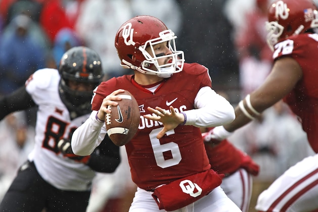 NORMAN, OK - DECEMBER 3: Quarterback Baker Mayfield #6 of the Oklahoma Sooners looks to throw during the game against the Oklahoma State Cowboys December 3, 2016 at Gaylord Family-Oklahoma Memorial Stadium in Norman, Oklahoma. Oklahoma defeated Oklahoma State 38-20 to become Big XII champions. (Photo by Brett Deering/Getty Images)