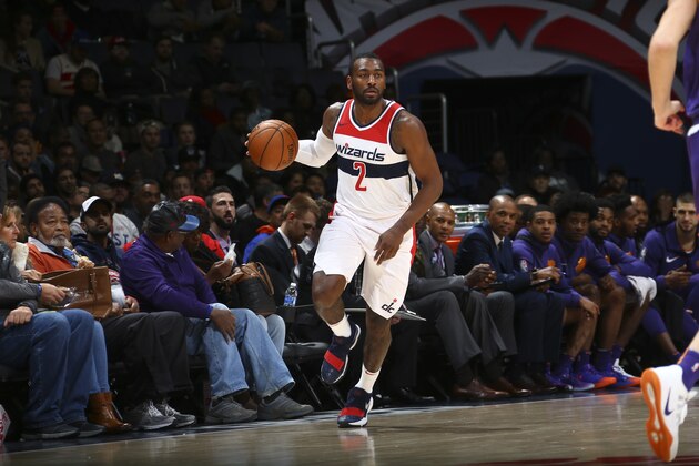 WASHINGTON, DC -  NOVEMBER 1: John Wall #2 of the Washington Wizards handles the ball against the Phoenix Suns on November 1, 2017 at Capital One Arena in Washington, DC. NOTE TO USER: User expressly acknowledges and agrees that, by downloading and or using this Photograph, user is consenting to the terms and conditions of the Getty Images License Agreement. Mandatory Copyright Notice: Copyright 2017 NBAE (Photo by Ned Dishman/NBAE via Getty Images)