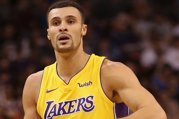 PHOENIX, AZ - OCTOBER 20:  Larry Nance Jr. #7 of the Los Angeles Lakers looks to pass during the NBA game against the Phoenix Suns at Talking Stick Resort Arena on October 20, 2017 in Phoenix, Arizona. The Lakers defeated the Suns 132-130.  NOTE TO USER: User expressly acknowledges and agrees that, by downloading and or using this photograph, User is consenting to the terms and conditions of the Getty Images License Agreement.  (Photo by Christian Petersen/Getty Images)