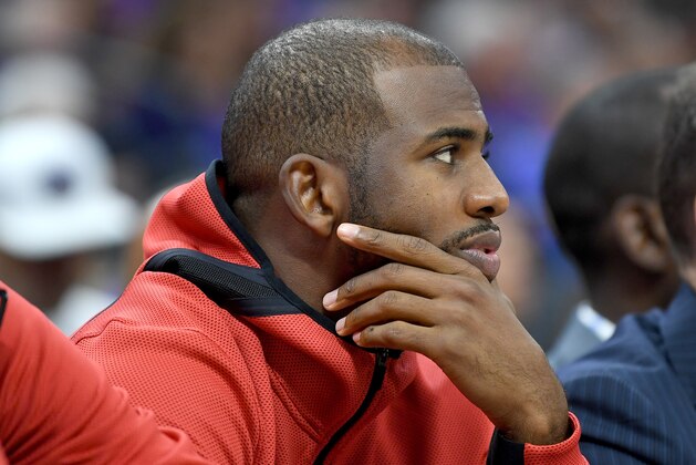 SACRAMENTO, CA - OCTOBER 18:  Chris Paul #3 of the Houston Rockets looks on from the bench against the Sacramento Kings during an NBA basketball game at Golden 1 Center on October 18, 2017 in Sacramento, California.  (Photo by Thearon W. Henderson/Getty Images)