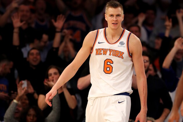 NEW YORK, NY - NOVEMBER 03:  Kristaps Porzingis #6 of the New York Knicks reacts after a dunk in the fourth quarter against the Phoenix Suns at Madison Square Garden on November 3, 2017 in New York City. NOTE TO USER: User expressly acknowledges and agrees that, by downloading and or using this Photograph, user is consenting to the terms and conditions of the Getty Images License Agreement  (Photo by Elsa/Getty Images)