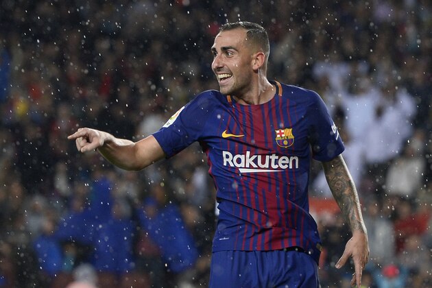 Barcelona's Spanish forward Paco Alcacer celebrates after scoring a goal during the Spanish league football match FC Barcelona vs Sevilla FC at the Camp Nou stadium in Barcelona on November 4, 2017. / AFP PHOTO / Josep LAGO        (Photo credit should read JOSEP LAGO/AFP/Getty Images)