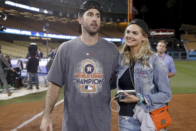 Houston Astros' Justin Verlander celebrates with Kate Upton after Game 7 of baseball's World Series against the Los Angeles Dodgers Wednesday, Nov. 1, 2017, in Los Angeles. The Astros won 5-1 to win the series 4-3. (AP Photo/Jae C. Hong)