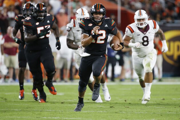 Miami quarterback Malik Rosier (12) runs for yardage during the first half of an NCAA College football game against Virginia Tech, Saturday, Nov. 4, 2017 in Miami Gardens, Fla. (AP Photo/Wilfredo Lee)