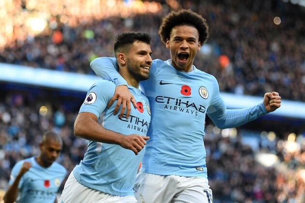 MANCHESTER, ENGLAND - NOVEMBER 05: Sergio Aguero of Manchester City celebrates scoring his sides second goal with Leroy Sane of Manchester City during the Premier League match between Manchester City and Arsenal at Etihad Stadium on November 5, 2017 in Manchester, England.  (Photo by Laurence Griffiths/Getty Images)