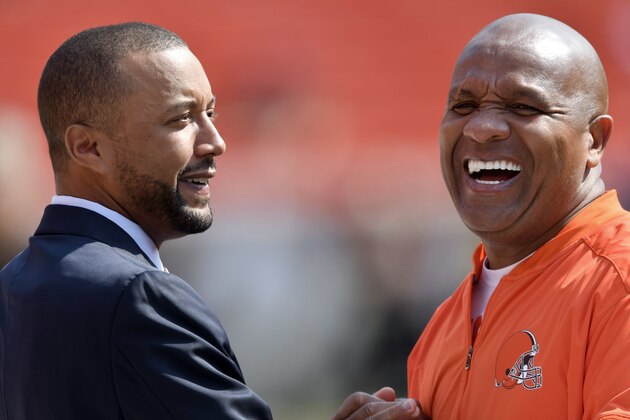 Executive Vice President Sashi Brown, left shares a laugh with head coach Hue Jackson before an NFL football game between the Pittsburgh Steelers and the Cleveland Browns, Sunday, Sept. 10, 2017, in Cleveland. (AP Photo/David Richard)