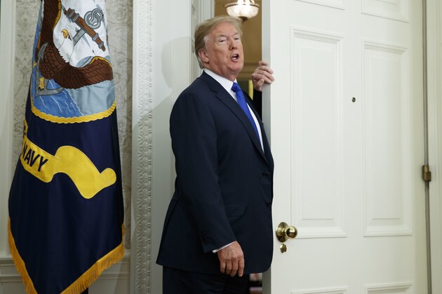 President Donald Trump talks with reporters as he leaves an event to announce that Broadcom is moving its global headquarters to the United States, in the Oval Office of the White House, Thursday, Nov. 2, 2017, in Washington. (AP Photo/Evan Vucci)